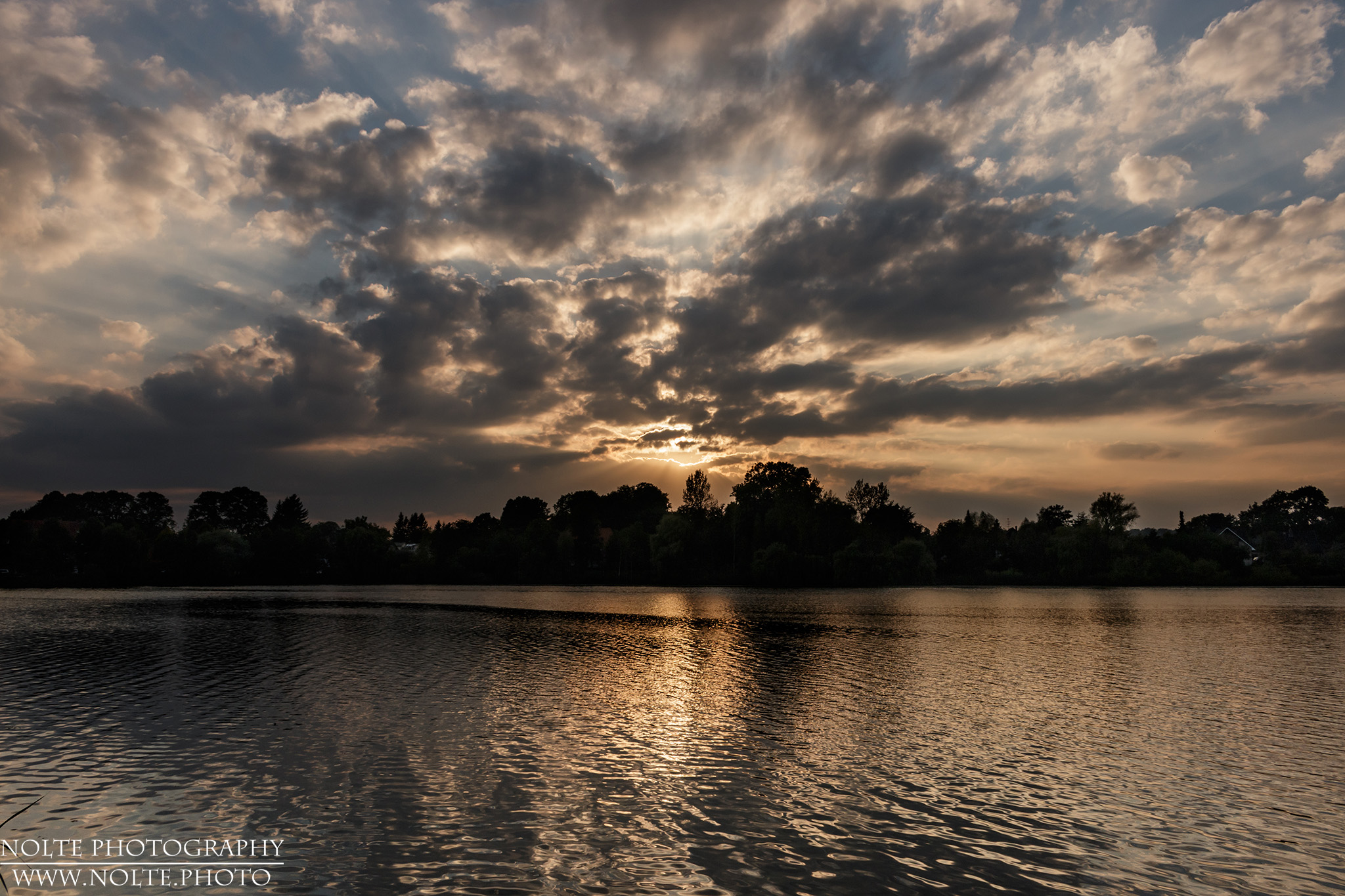 Sonnenuntergang über dem Reinfelder Karpfenteich